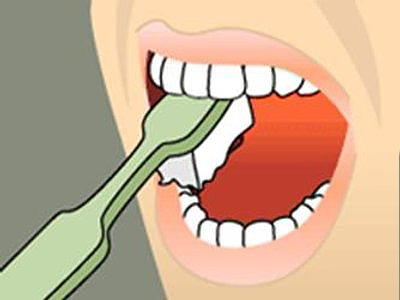 Person brushing teeth with toothbrush, demonstrating proper oral hygiene technique.
