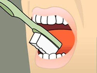 Animated illustration of open mouth with white tooth being inserted or extracted against orange background.