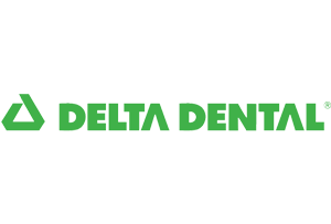 Delta Dental logo in green with triangular shield icon and text wordmark